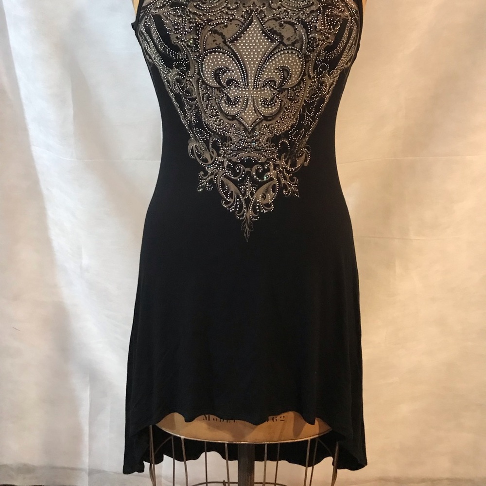 Vocal tank style asymmetrical blouse.